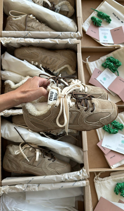 New Balance X Miu Miu 530 SL bleached leather sneakers